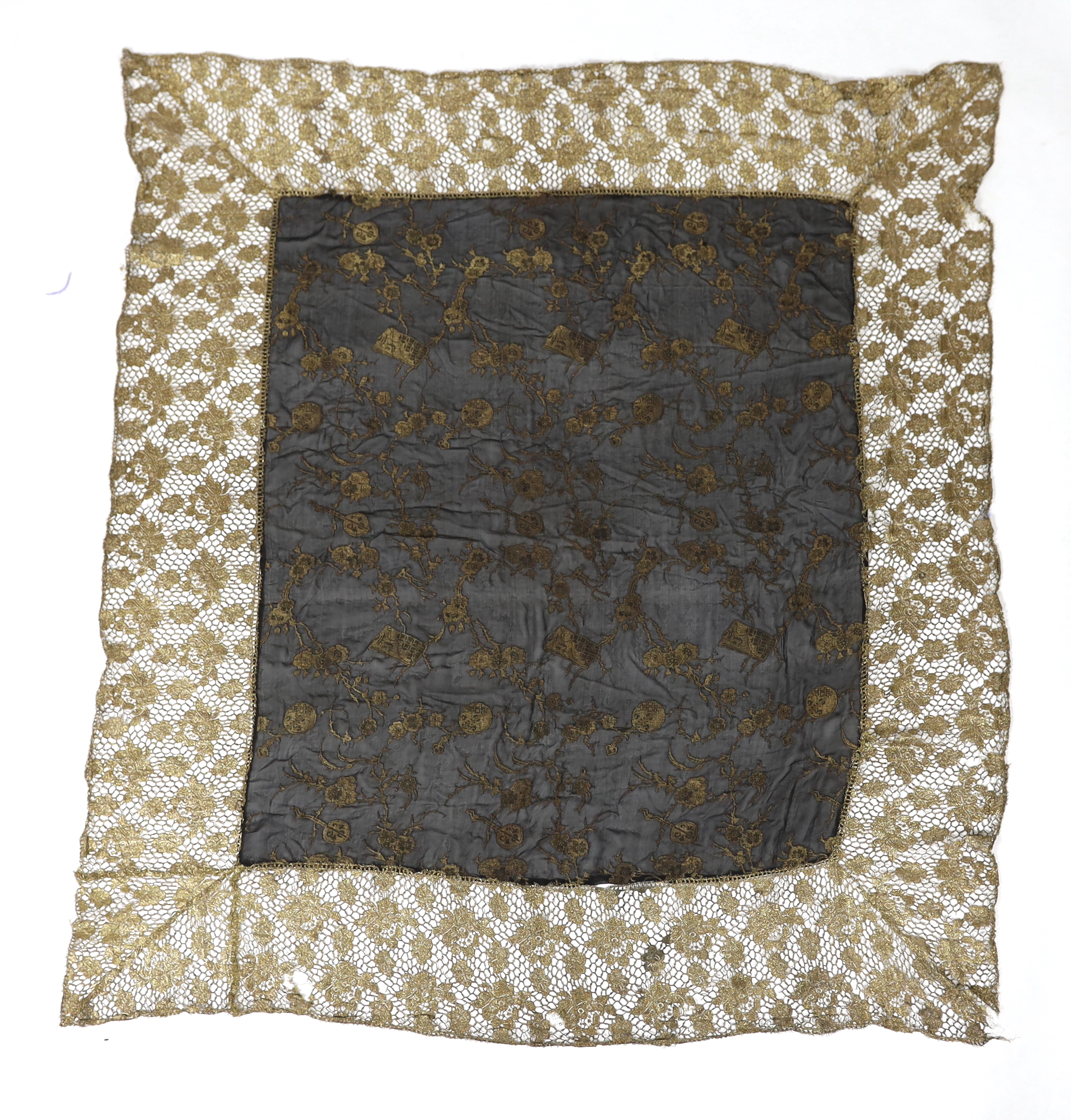 An unusual 1920's gold lace and black silk chiffon gold brocade boudoir cover, 140 x116cm